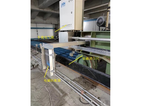 筒倉可逆皮帶輸送機卸料車定位與無人化控制系統